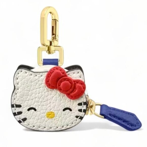 Hello Kitty Handbags - NEW - HELLO KITTY FAUX LEATHER MINI STORAGE HAEDPHONE/COIN PURSE FULL ZIP